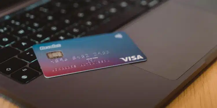 blue and white visa card on silver laptop computer